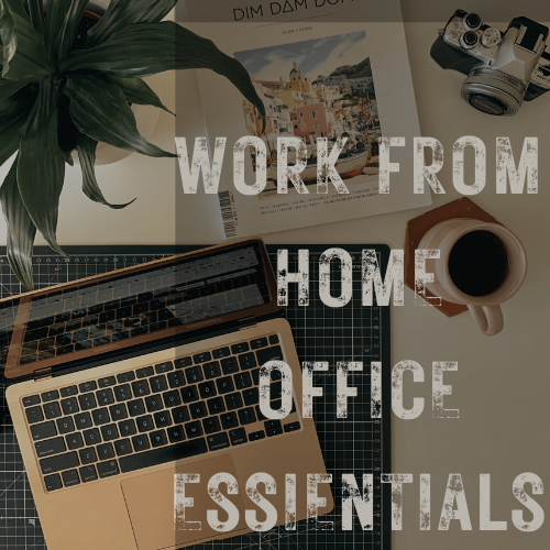 A cozy home office setup featuring a steaming cup of coffee, a green potted plant, a sleek laptop on a wooden desk pad, and a professional camera nearby. The arrangement creates an inviting workspace that promotes productivity and comfort.